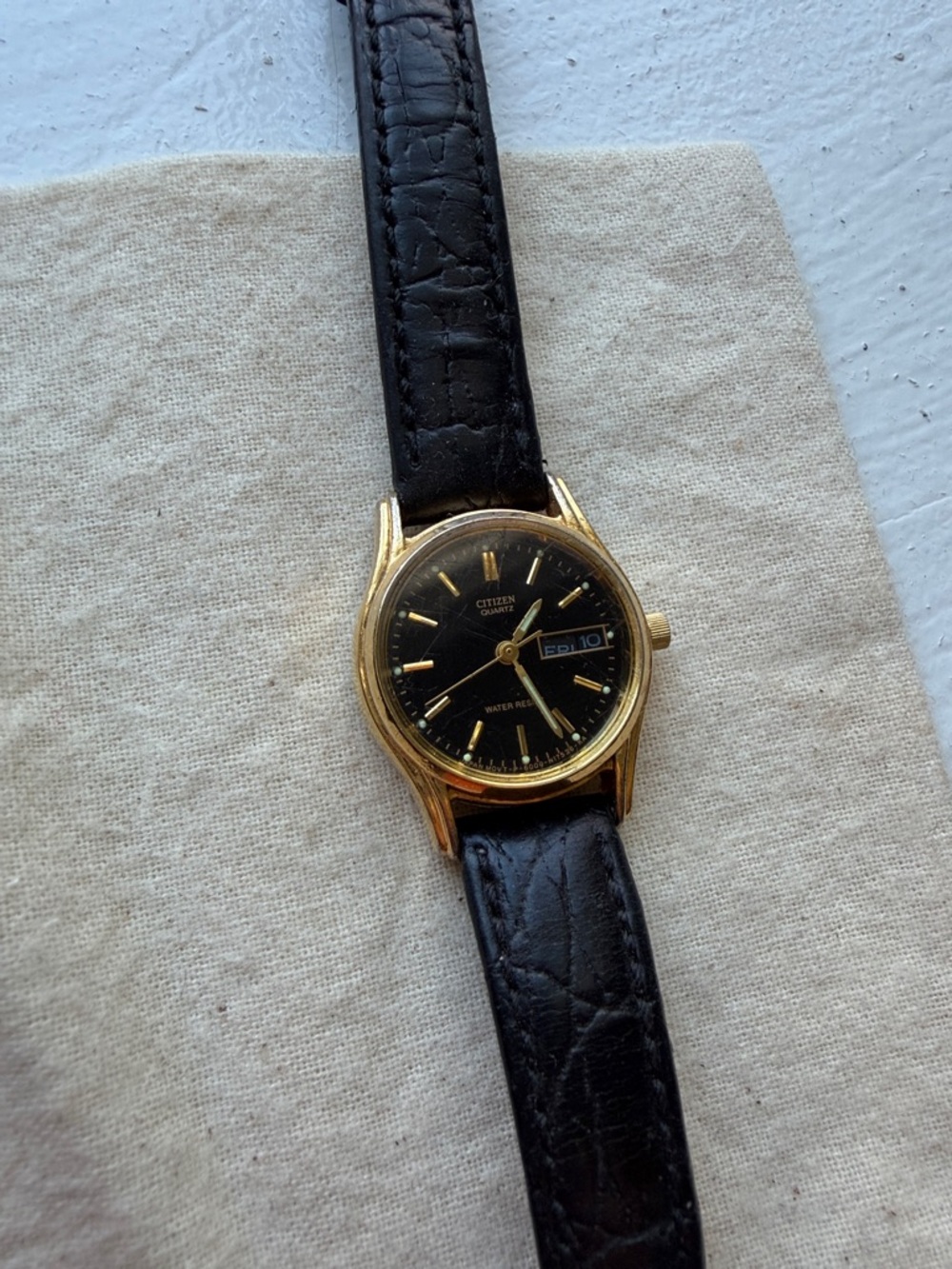 Citizen Gold-Tone Watch with Black Dial and Black Leather Strap